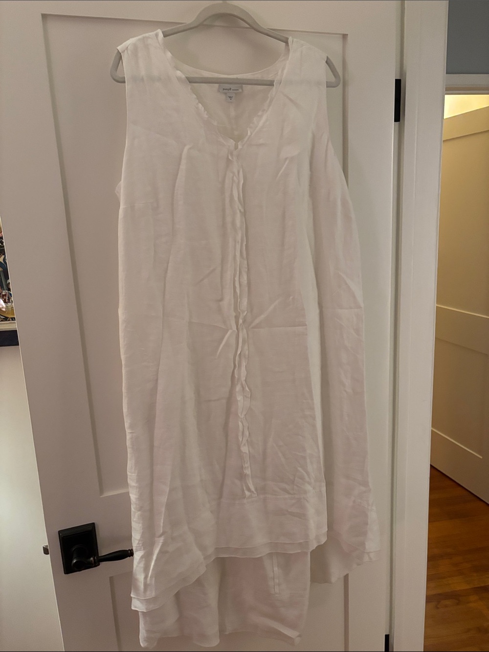 Sleeveless White High-Low Linen Dress with Front Ruffle